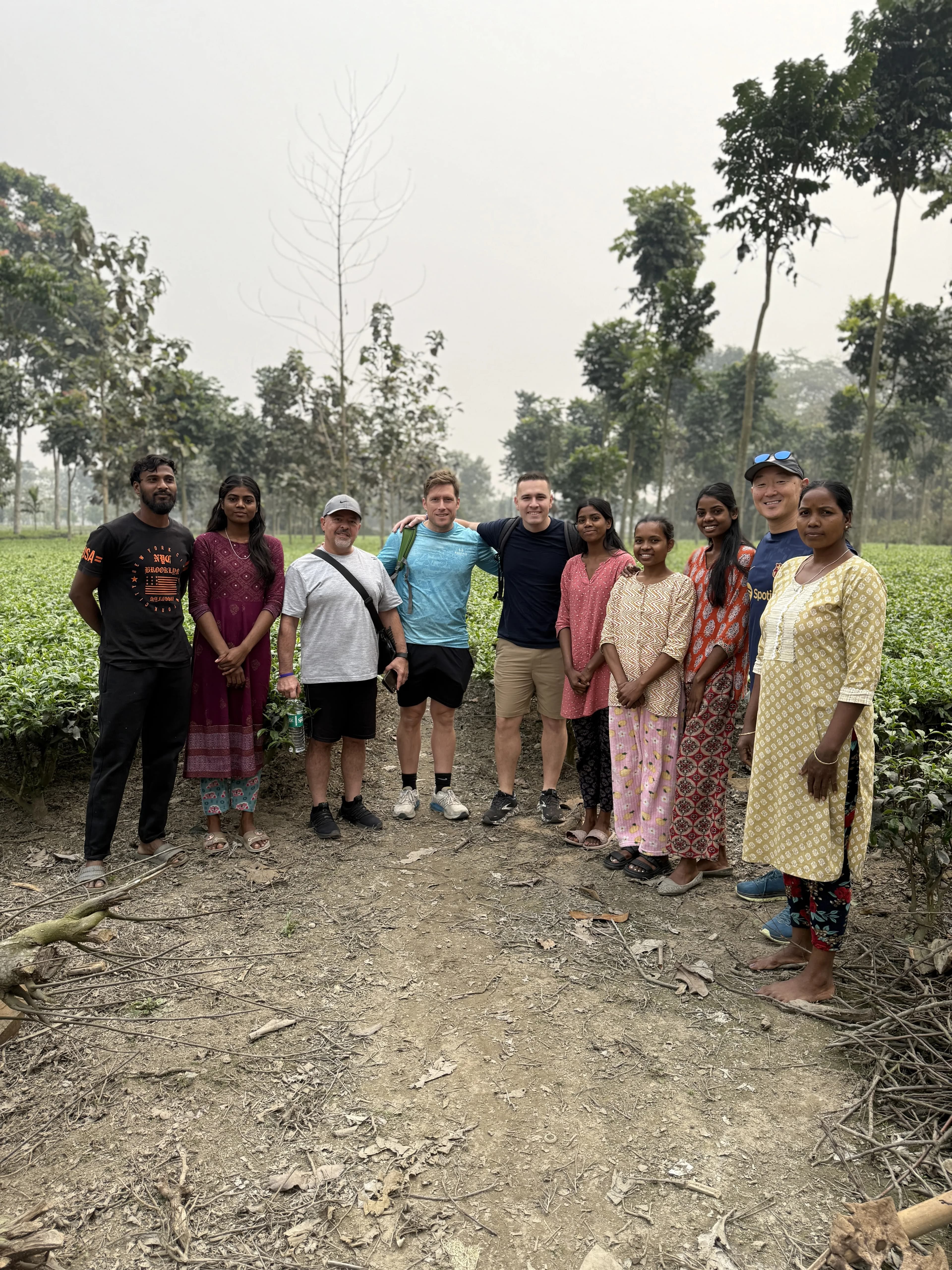 Group photo with local community in South Asia